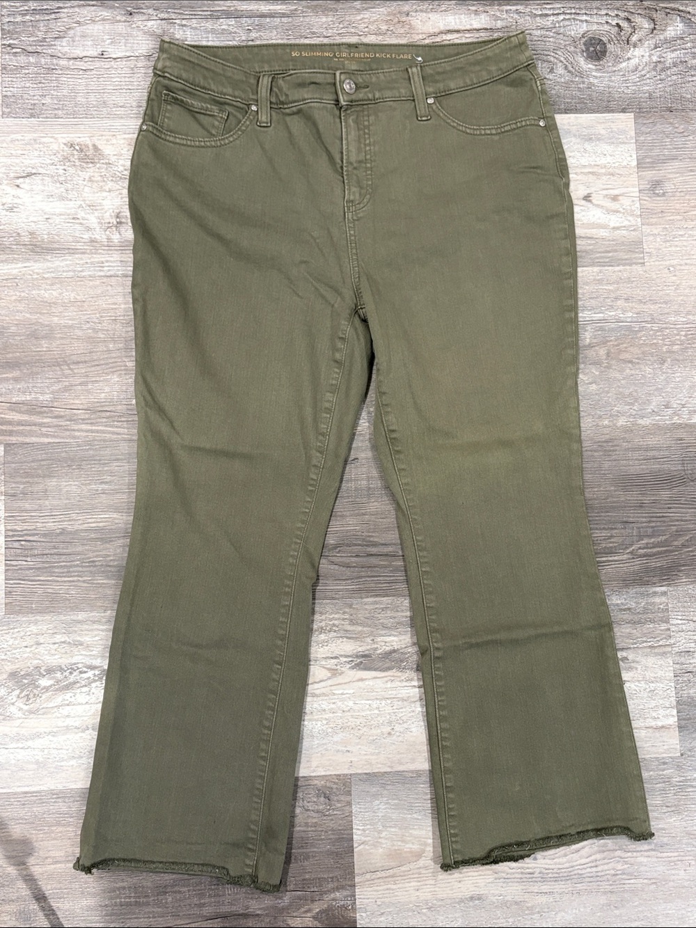 Chico's So Slimming Girlfriend Kick Flare Jeans in a khaki/olive green